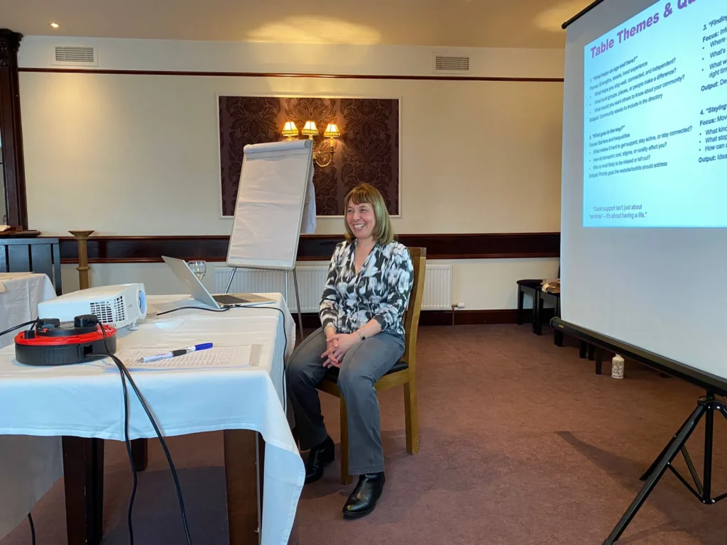 Patricia delivering an IMPACT presentation at the World Cafe event